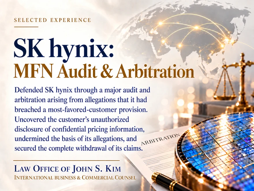 Selected-experience card on a pale ground titled “SK hynix: MFN Audit & Arbitration,” showing brass scales of justice, a bound arbitration document and a semiconductor wafer beneath a faint world map, beside a paragraph describing the defense and its outcome. The Law Office of John S. Kim wordmark and the line “International Business & Commercial Counsel” appear in the lower left.